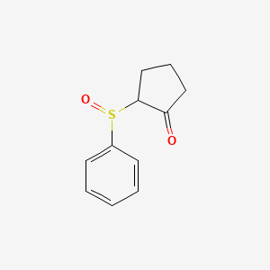 molecular formula C11H12O2S B14626637 Cyclopentanone, 2-(phenylsulfinyl)- CAS No. 55980-76-2