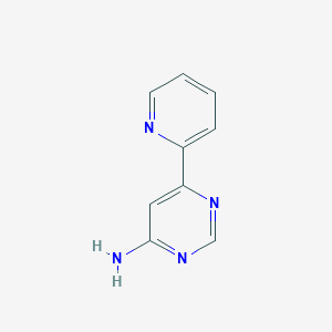 molecular formula C9H8N4 B1463050 6-(Pyridin-2-yl)pyrimidin-4-amine CAS No. 1159818-72-0