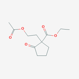 molecular formula C12H18O5 B14634279 Ethyl 1-[2-(acetyloxy)ethyl]-2-oxocyclopentane-1-carboxylate CAS No. 54460-32-1