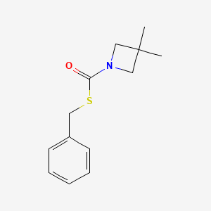 molecular formula C13H17NOS B14638810 S-Benzyl 3,3-dimethylazetidine-1-carbothioate CAS No. 54395-81-2