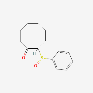 molecular formula C14H18O2S B14642328 Cyclooctanone, 2-(phenylsulfinyl)- CAS No. 55705-18-5