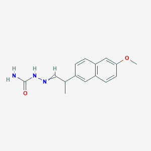 molecular formula C15H17N3O2 B14643890 2-[2-(6-Methoxynaphthalen-2-yl)propylidene]hydrazine-1-carboxamide CAS No. 54215-40-6