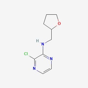 B1464526 3-chloro-N-[(oxolan-2-yl)methyl]pyrazin-2-amine CAS No. 1247795-87-4