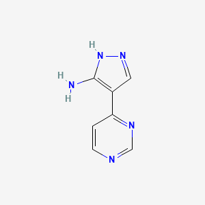 molecular formula C7H7N5 B1464745 4-(嘧啶-4-基)-1H-吡唑-5-胺 CAS No. 1111638-49-3