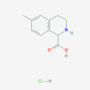 molecular formula C11H14ClNO2 B1465018 6-Methyl-1,2,3,4-tetrahydro-isoquinoline-1-carboxylic acid hydrochloride CAS No. 1260637-11-3