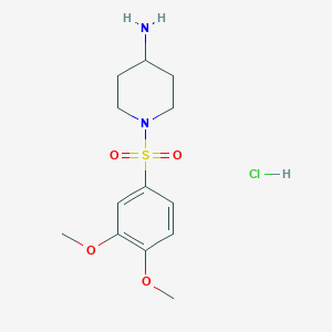 molecular formula C13H21ClN2O4S B1465085 1-(3,4-Dimethoxybenzenesulfonyl)piperidin-4-amine hydrochloride CAS No. 1315367-02-2