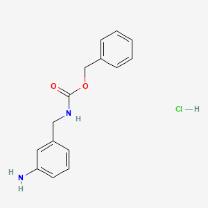 molecular formula C15H17ClN2O2 B1465106 3-N-Cbz-aminomethylaniline hcl CAS No. 1159826-16-0