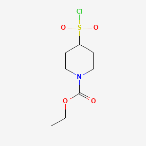 molecular formula C8H14ClNO4S B1465149 Ethyl 4-(chlorosulfonyl)piperidine-1-carboxylate CAS No. 1211538-59-8