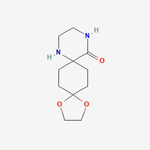 molecular formula C11H18N2O3 B1466863 1,4-Dioxa-9,12-diazadispiro[4.2.5.2]pentadecan-13-one CAS No. 1263475-11-1