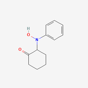 molecular formula C12H15NO2 B14670728 Cyclohexanone, 2-(hydroxyphenylamino)- CAS No. 38382-25-1
