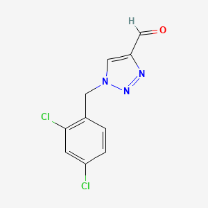 molecular formula C10H7Cl2N3O B1467293 1-[(2,4-dichlorophenyl)methyl]-1H-1,2,3-triazole-4-carbaldehyde CAS No. 1491960-80-5