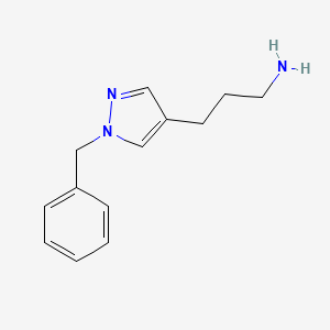molecular formula C13H17N3 B1467977 3-(1-benzyl-1H-pyrazol-4-yl)propan-1-amine CAS No. 1341281-61-5