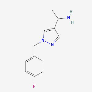 molecular formula C12H14FN3 B1467978 1-{1-[(4-fluorophenyl)methyl]-1H-pyrazol-4-yl}ethan-1-amine CAS No. 1341923-62-3
