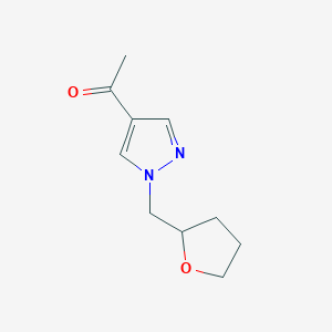 molecular formula C10H14N2O2 B1467989 1-(1-((tetrahydrofuran-2-yl)methyl)-1H-pyrazol-4-yl)ethan-1-one CAS No. 1341595-62-7