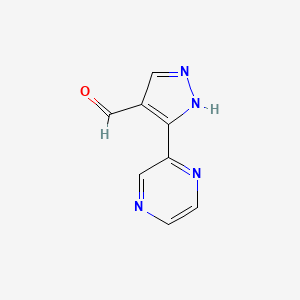 molecular formula C8H6N4O B1469174 3-(pyrazin-2-yl)-1H-pyrazole-4-carbaldehyde CAS No. 1343011-99-3