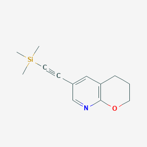 B1469525 6-((Trimethylsilyl)ethynyl)-3,4-dihydro-2H-pyrano[2,3-b]pyridine CAS No. 1346446-98-7