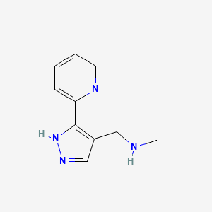 molecular formula C10H12N4 B1470124 N-methyl-1-(3-(pyridin-2-yl)-1H-pyrazol-4-yl)methanamine CAS No. 1537198-60-9