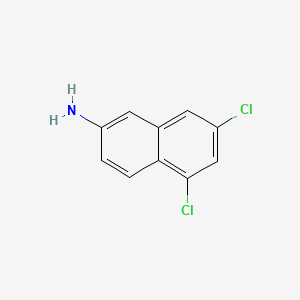molecular formula C10H7Cl2N B14702137 5,7-Dichloro-2-naphthylamine CAS No. 23417-67-6