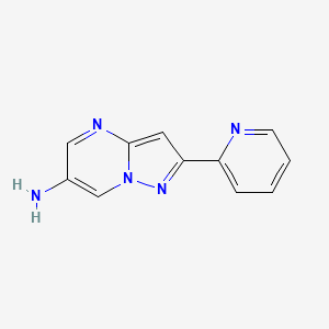 molecular formula C11H9N5 B1470216 2-(Pyridin-2-yl)pyrazolo[1,5-a]pyrimidin-6-amine CAS No. 1466923-79-4