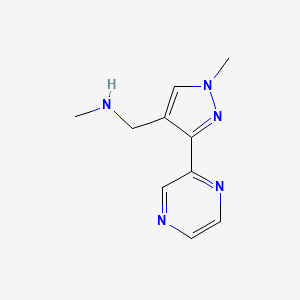 molecular formula C10H13N5 B1470497 N-methyl-1-(1-methyl-3-(pyrazin-2-yl)-1H-pyrazol-4-yl)methanamine CAS No. 1519686-43-1