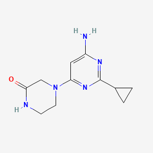 molecular formula C11H15N5O B1470753 4-(6-Amino-2-cyclopropylpyrimidin-4-yl)piperazin-2-one CAS No. 1499856-41-5