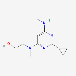 molecular formula C11H18N4O B1470809 2-((2-Cyclopropyl-6-(methylamino)pyrimidin-4-yl)(methyl)amino)ethan-1-ol CAS No. 1538027-64-3