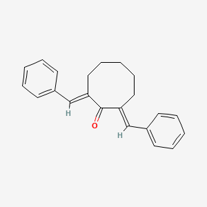 molecular formula C22H22O B14717923 2,8-Dibenzylidenecyclooctanone CAS No. 21856-74-6
