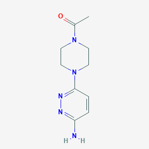 molecular formula C10H15N5O B1471935 1-[4-(6-Aminopyridazin-3-yl)piperazin-1-yl]ethan-1-one CAS No. 1523744-58-2