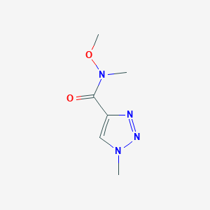 molecular formula C6H10N4O2 B1472732 N-methoxy-N,1-dimethyl-1H-1,2,3-triazole-4-carboxamide CAS No. 1864650-82-7