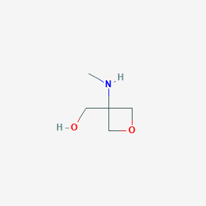 molecular formula C5H11NO2 B1473353 3-Methylamino-3-hydroxymethyloxetane CAS No. 1416323-17-5