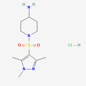 molecular formula C11H21ClN4O2S B1473418 1-[(1,3,5-trimethyl-1H-pyrazol-4-yl)sulfonyl]piperidin-4-amine hydrochloride CAS No. 2038218-13-0