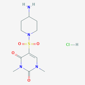 molecular formula C11H19ClN4O4S B1473419 5-[(4-aminopiperidin-1-yl)sulfonyl]-1,3-dimethylpyrimidine-2,4(1H,3H)-dione hydrochloride CAS No. 2097978-77-1