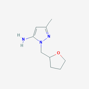 molecular formula C9H15N3O B1473904 3-methyl-1-((tetrahydrofuran-2-yl)methyl)-1H-pyrazol-5-amine CAS No. 1546435-81-7