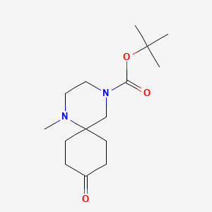 molecular formula C15H26N2O3 B1474059 Tert-butyl 1-methyl-9-oxo-1,4-diazaspiro[5.5]undecane-4-carboxylate CAS No. 1424939-92-3
