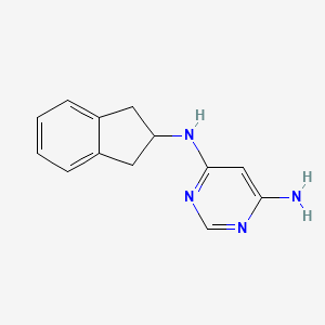 molecular formula C13H14N4 B1474890 N4-(2,3-dihydro-1H-inden-2-yl)pyrimidine-4,6-diamine CAS No. 1944386-08-6
