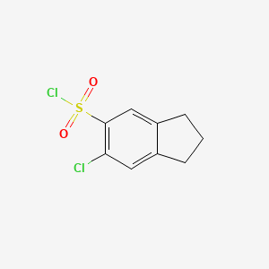 molecular formula C9H8Cl2O2S B1475051 6-Chloro-2,3-dihydro-1H-indene-5-sulfonyl chloride CAS No. 1541069-38-8