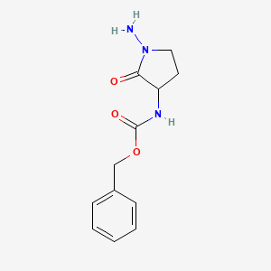 molecular formula C12H15N3O3 B14778081 benzyl N-(1-amino-2-oxopyrrolidin-3-yl)carbamate 