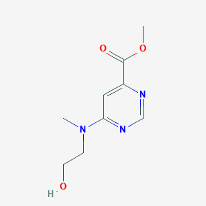 molecular formula C9H13N3O3 B1480328 Methyl 6-((2-hydroxyethyl)(methyl)amino)pyrimidine-4-carboxylate CAS No. 2098012-50-9