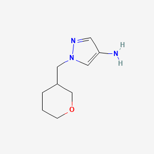 molecular formula C9H15N3O B1480549 1-((tetrahydro-2H-pyran-3-yl)methyl)-1H-pyrazol-4-amine CAS No. 2098067-67-3