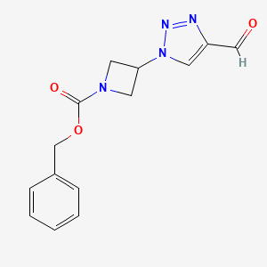 molecular formula C14H14N4O3 B1480580 benzyl 3-(4-formyl-1H-1,2,3-triazol-1-yl)azetidine-1-carboxylate CAS No. 2098110-11-1