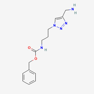 molecular formula C14H19N5O2 B1480661 benzyl (3-(4-(aminomethyl)-1H-1,2,3-triazol-1-yl)propyl)carbamate CAS No. 2098071-22-6