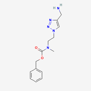 molecular formula C14H19N5O2 B1481231 benzyl (2-(4-(aminomethyl)-1H-1,2,3-triazol-1-yl)ethyl)(methyl)carbamate CAS No. 2098071-04-4