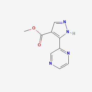 molecular formula C9H8N4O2 B1482278 methyl 3-(pyrazin-2-yl)-1H-pyrazole-4-carboxylate CAS No. 2098131-57-6