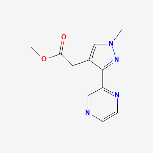 molecular formula C11H12N4O2 B1483134 methyl 2-(1-methyl-3-(pyrazin-2-yl)-1H-pyrazol-4-yl)acetate CAS No. 2098088-02-7