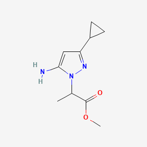 molecular formula C10H15N3O2 B1483865 methyl 2-(5-amino-3-cyclopropyl-1H-pyrazol-1-yl)propanoate CAS No. 2098087-93-3