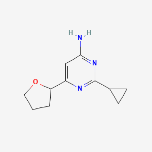 molecular formula C11H15N3O B1484170 2-Cyclopropyl-6-(oxolan-2-yl)pyrimidin-4-amine CAS No. 2098072-95-6