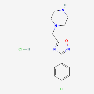 molecular formula C13H16Cl2N4O B1486609 1-{[3-(4-Chlorophenyl)-1,2,4-oxadiazol-5-yl]methyl}piperazine hydrochloride CAS No. 1170477-01-6