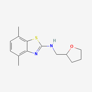 4,7-dimethyl-N-(tetrahydrofuran-2-ylmethyl)-1,3-benzothiazol-2-amine