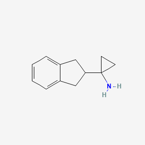 molecular formula C12H15N B1487949 1-(2,3-dihydro-1H-inden-2-yl)cyclopropan-1-amine CAS No. 1468889-61-3