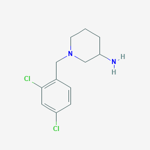 molecular formula C12H16Cl2N2 B1488217 1-[(2,4-Dichlorophenyl)methyl]piperidin-3-amine CAS No. 1249822-75-0